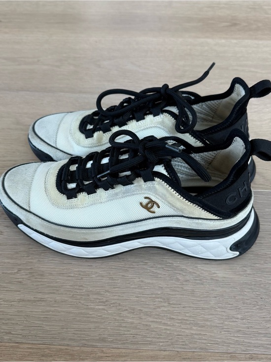 CHANEL Shoes - CHANEL Ivory and Black Mesh Sneaker with Interlocking Gold CC Logo
